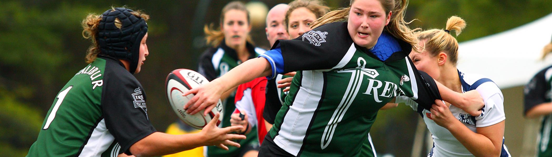 Women's outdoor rugby game in the fall at the Justin Chiu stadium