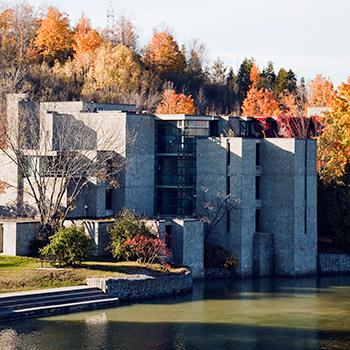 Exterior view of Champlain College in the fall around mid-day